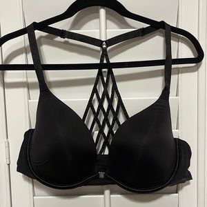 Black satin strappy t-back bra with front clasp size 42B